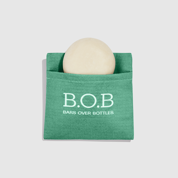 bolsinha verde para transportar cosmeticos em barra